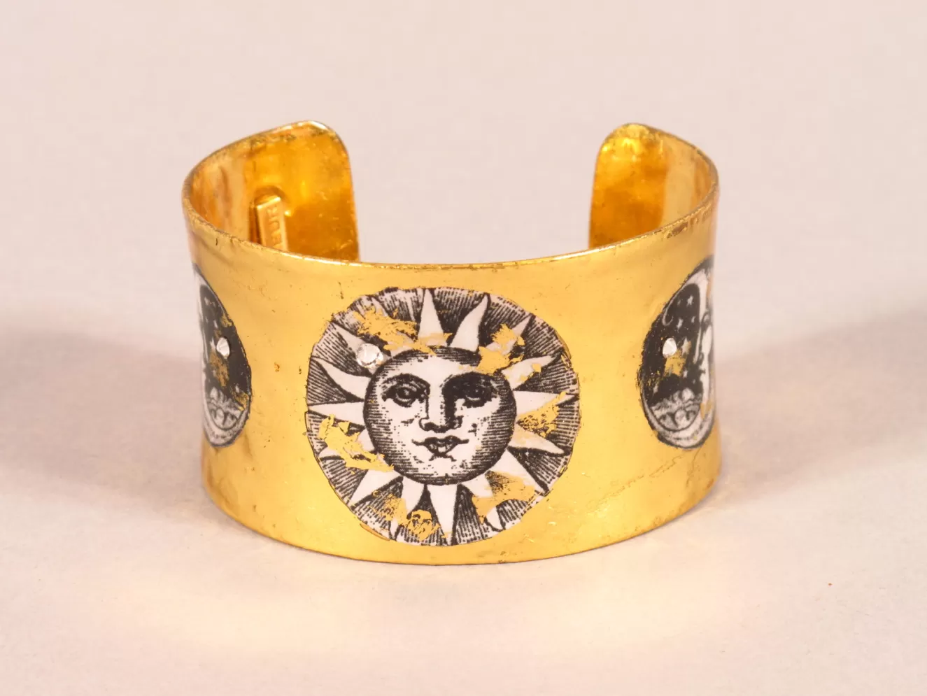 * Gifts>Evocateur. Sun And Moon Corset Cuff.